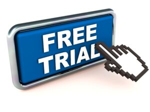 an illustration shows a blue free trial button with a cartoonish hand pointing to it.