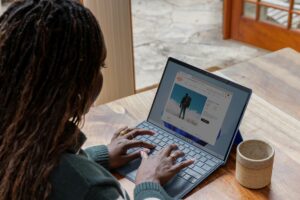 a remote worker uses a tablet with a keyboard